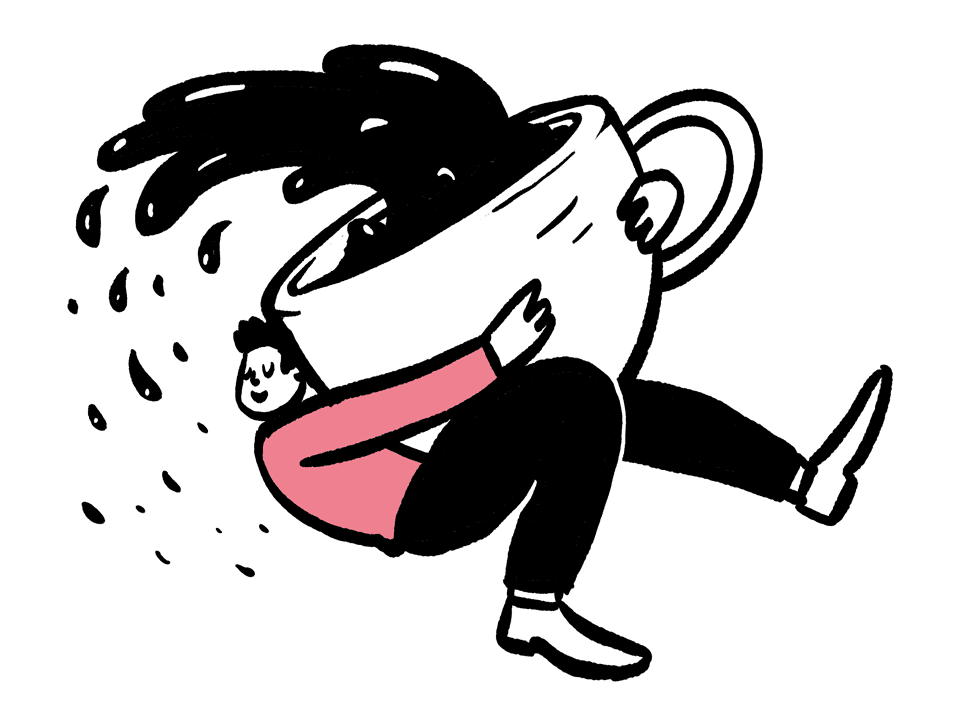 A person hugging a giant cup of coffee